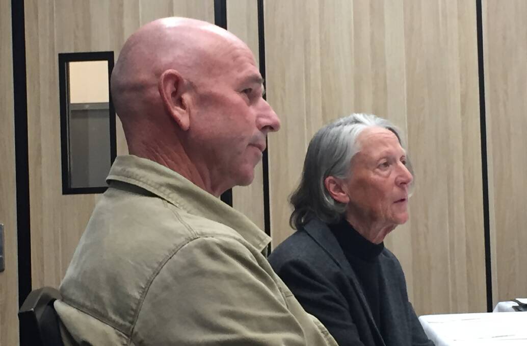 ANGRY: Williamtown residents Jenny and Terry Robinson addressing the federal government inquiry into PFAS contamination in Williamtown on Tuesday.
