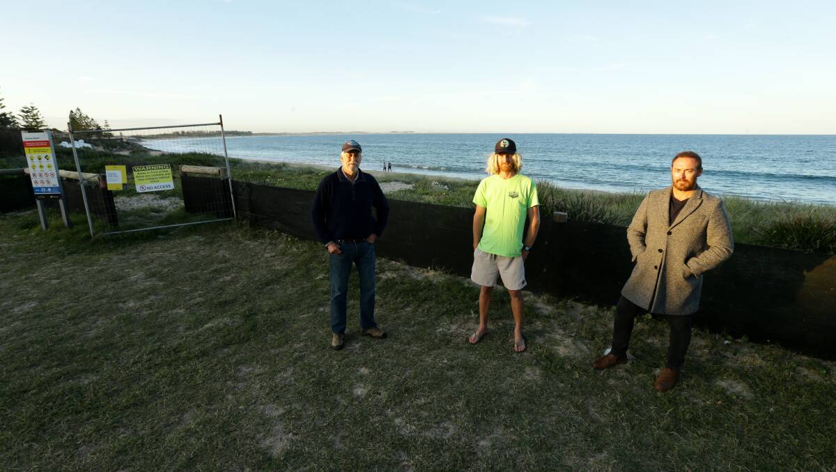SAND AND DELIVER: Stockton residents, from left, Professor Ron Boyd, Simon Jones and Lucas Gresham are campaigning for sand nourishment as the best option to save the beach from severe erosion.