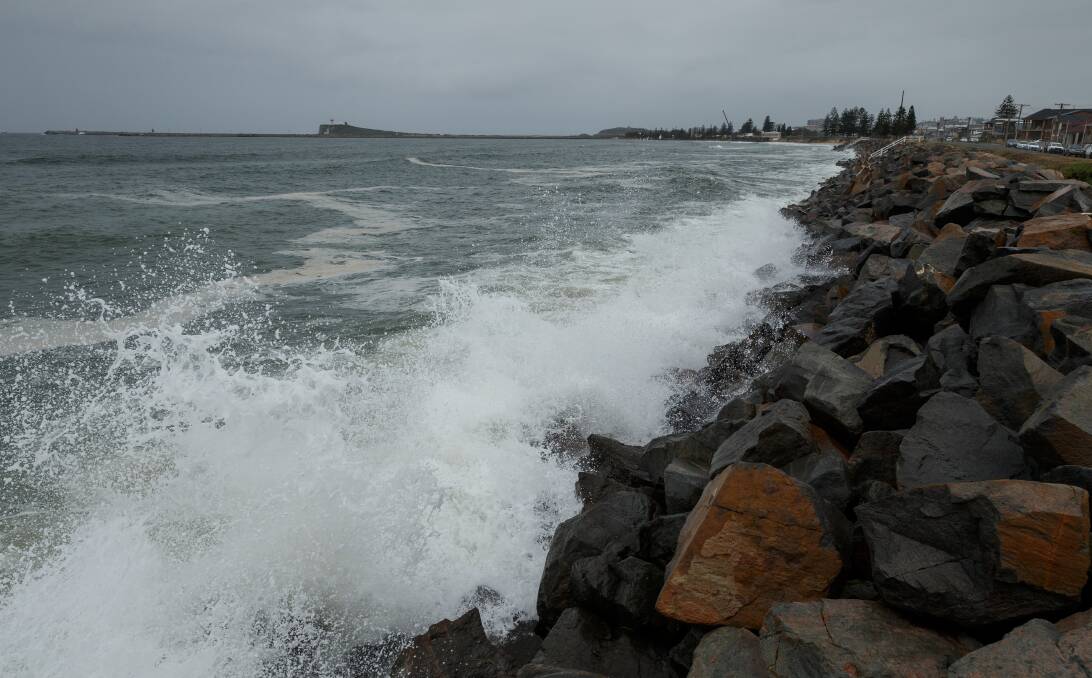 REPAIRS: More than $4.5 million will be spent upgrading the Mitchell Street rock wall that is the only thing that stands between the sea and a row of houses. Its height will increase by about a metre.