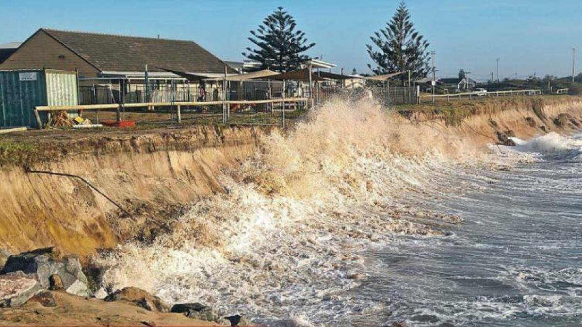 Waves pounding the now demolished child-care centre in Barrie Crescent, Stockton, during heavy swells in January 2018. Picture: Daniel Danuser
