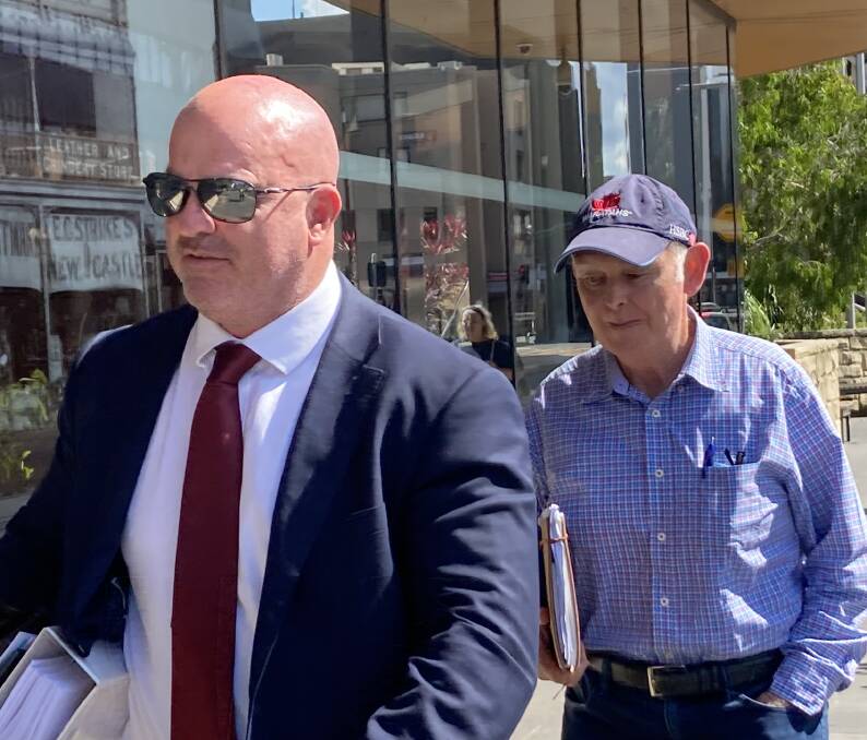 FRAUD: Veteran Maitland accountant Michael Unicomb, right, with his solicitor Mark Ramsland outside Newcastle District Court on Monday after pleading guilty to obtaining financial advantage by deception.