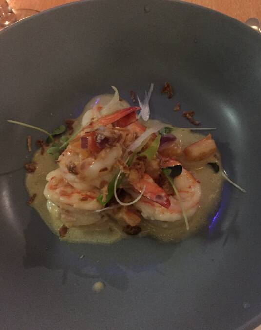 LIGHT: The garlic prawn entree is packed with flavour and texture.