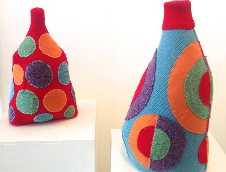 BOTTLED UP: Mandy Robinson's Spots of bother turns bottles into collage.
