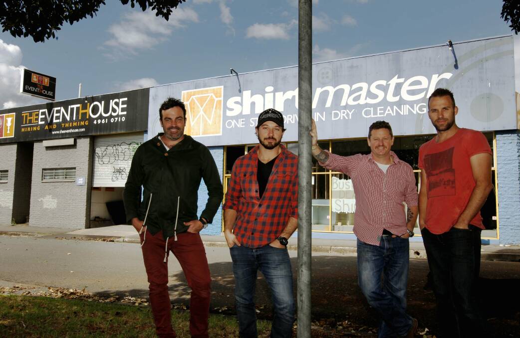 At the start: Chris Joannou, with hat, with business partners Tim Leveson, Harry Callinan and Chris Johnston outside the premises in Parry street in September, 2013, as The Edwards was being built. Picture: Darren Pateman