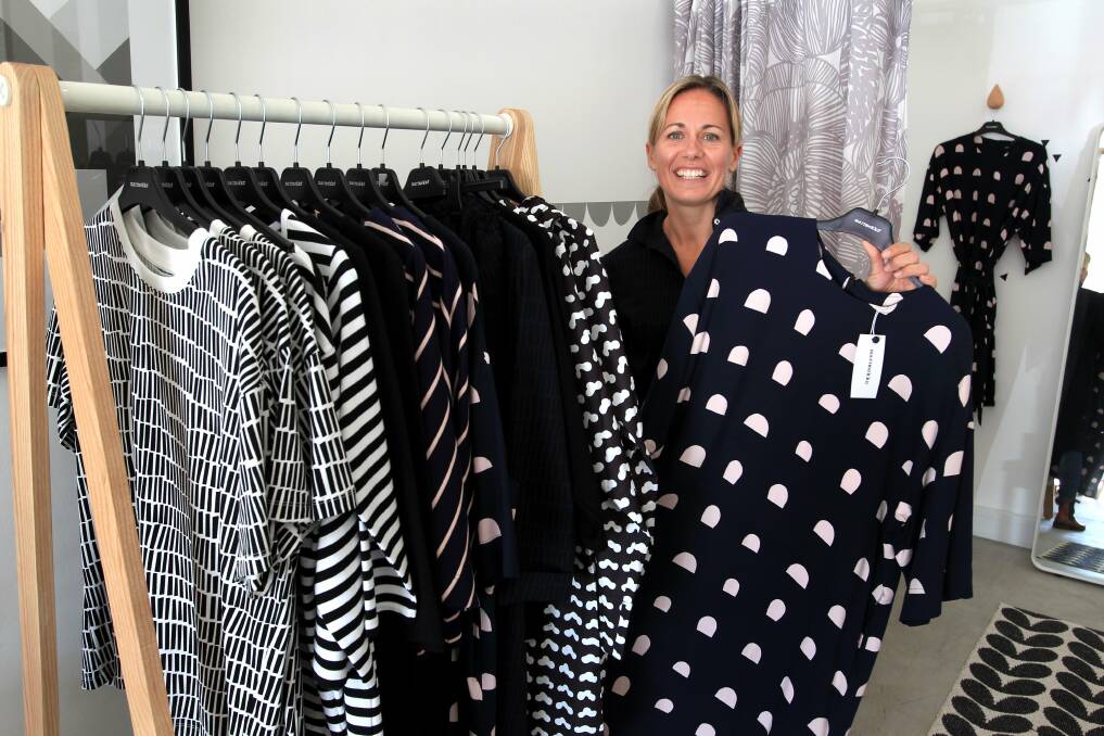 Scandi love: Pappa Sven owner Libby Helinski with clothing in her Cooks Hill store. Picture: Phil Hearn