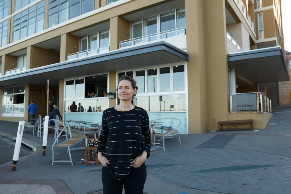 Voice at the table: Bec Bowie, owner of Estabar cafe in Newcastle East, says the community, businesses and council need to restart "from the ground up". Picture: Max Mason-Hubers