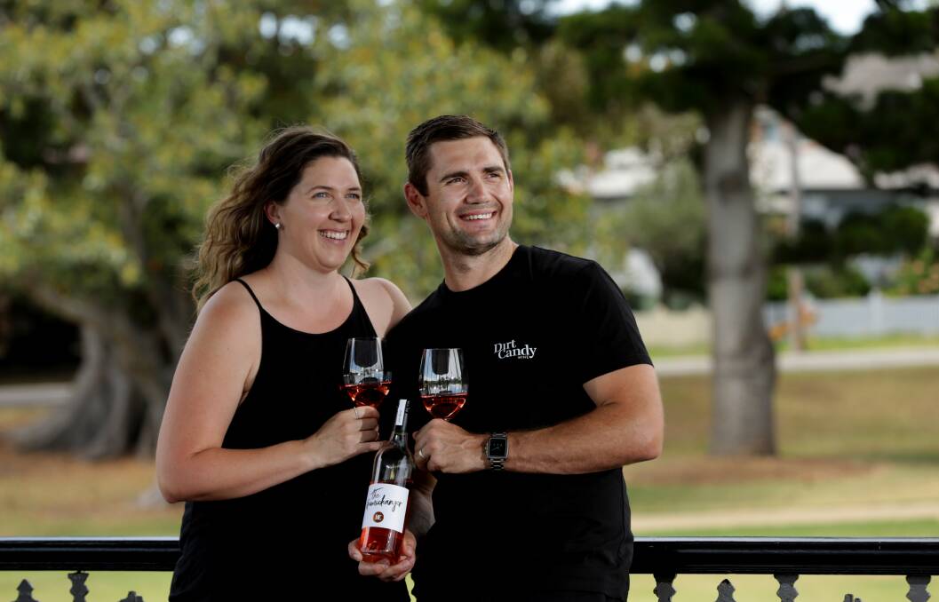 Grape success: Winemaker Daniel Payne and his wife Jenni with their small-batch wine Dirt Candy.  Picture: Simone de Peak