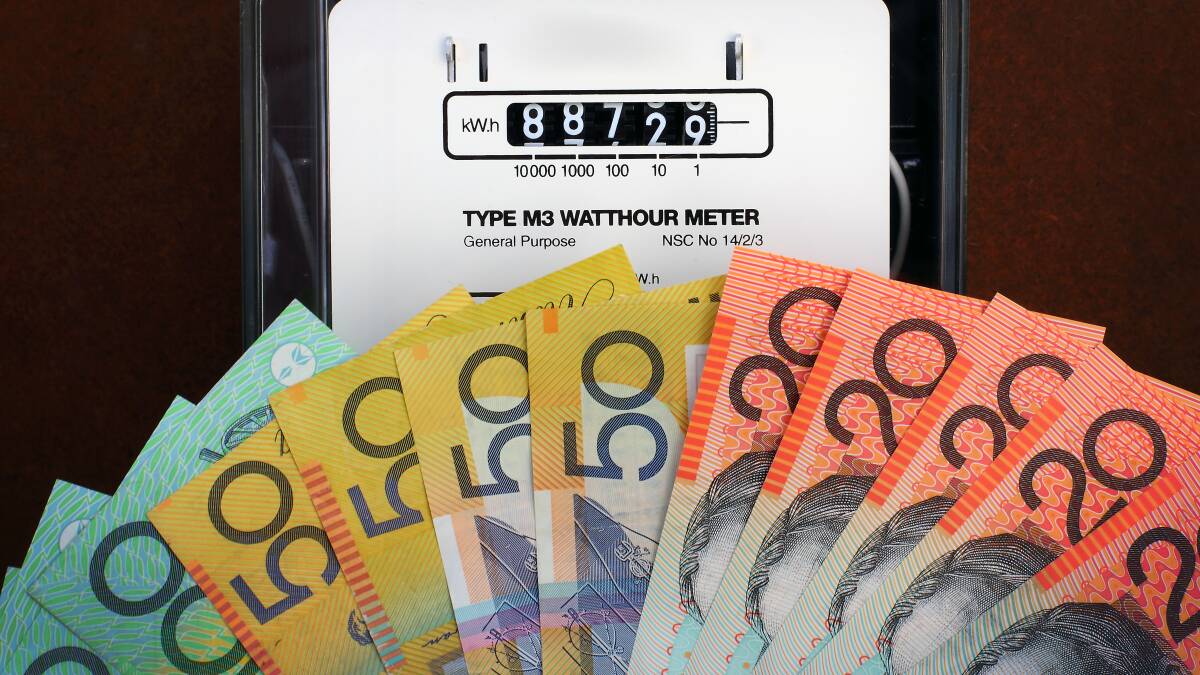 High cost of electricity in Australia Generic image of electricity meter with cash