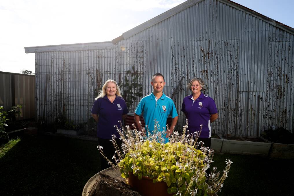 Willing and able: Jordy Threlfo, centre, runs a business with help from his mum Dee, left, and support worker Jen Quinn. Picture: Jonothan Carroll