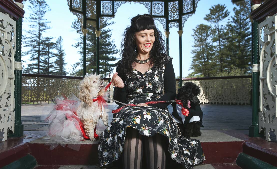 Behave yourself: Nadine Kellett with her pooches Rose, left, and Elvis, right. Picture: Marina Neil