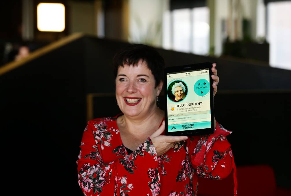 In touch: Susan Ryan with a tablet with her Uukoo app, which assists people with dementia and has broader applications. 