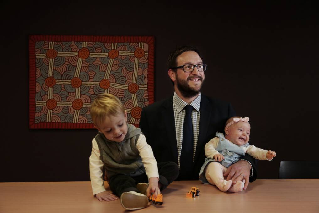 Fair go: "It's backwards," says Tom Hunter-Leahy, with his children Dylan, 2, and Ruby, of the parental leave scheme. Picture: Simone De Peak