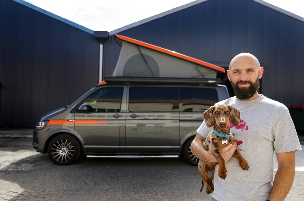 Van life: "I'm a camper van converter - it's not in the Aussie vernacular," says Brenton Miller, with pet Keith and van Stanley. Picture: Marina Neil