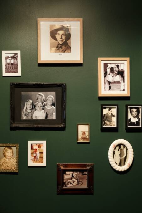 Making memories: Skeeta's On Darby bar's 'family wall' features photographs of Emma Kennedy's family. Picture: Max Mason-Hubers 