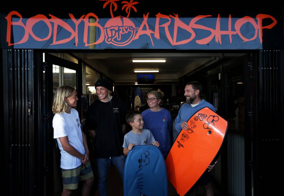 Family business: Sarah and John Cruickshank with their sons, from left, Brandyn, Hayden and Jaxon in their new store. Picture: Simone De Peak.