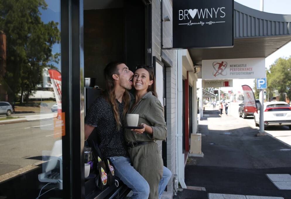 Return to the city: Dan Brown and his fiancee Nicola Black outside their new cafe Browny's in Newcastle West. Picture: Simone De Peak.
