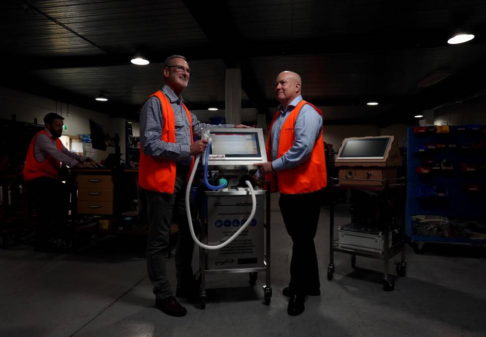 Innovation at work: From left, Ampcontrol product and development manager Chris Bird, Ampcontrol Group Manager in Engineering, Dr Ian Webster and Ampcontrol CEO Rod Henderson with the advanced prototype ventilator. Picture: Simone De Peak 