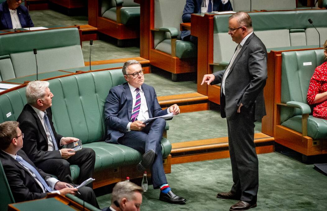 Joel Fitzgibbon (centre) speaks with Opposition Leader Anthony Albanese (right) in Parliament earlier this week. Picture: Elesa Kurtz