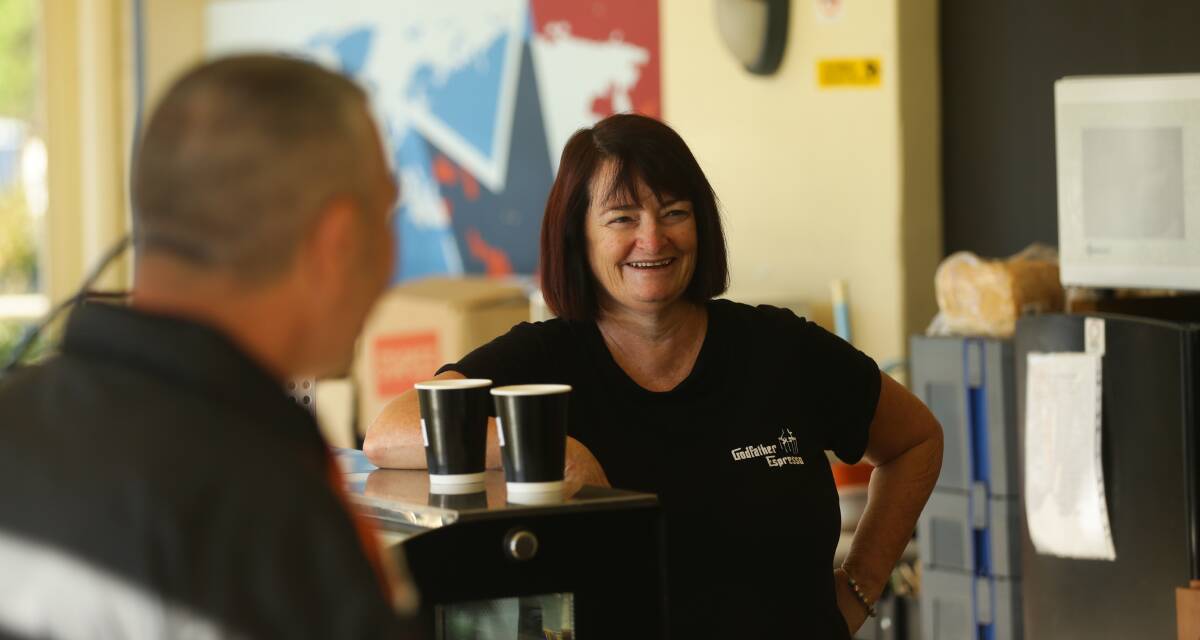  Compassion: Deb Scott at Godfather Espresso, which employs workers with disabilities and has partnered with Hunter Multicultural Communities Inc in Waratah to help community members most in need. Picture: Jonathan Carroll.