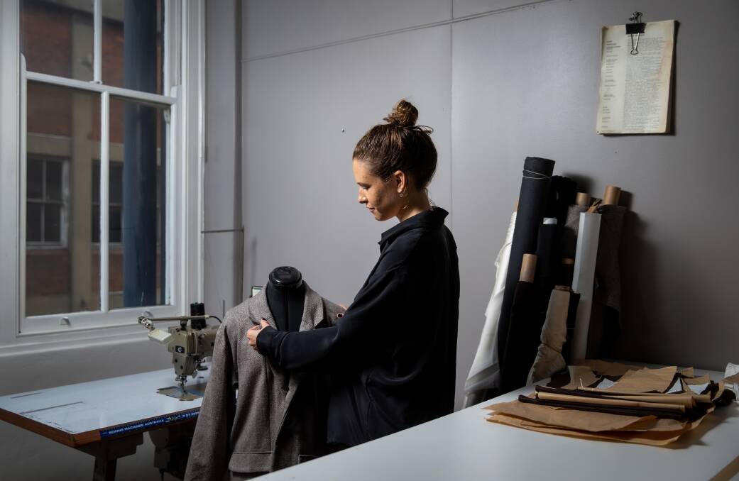 Labour of love: Laura Howard makes a piece for her label Saint in her Wickham studio. Picture: Marina Neil. 