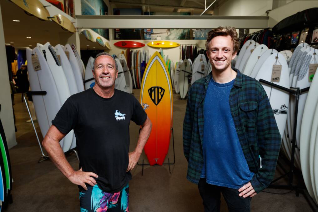 Partnership: Mick Adam and Tim Dickson have bought the iconic Newcastle surf store Slimes Boardstore. Picture Max Mason-Hubers 