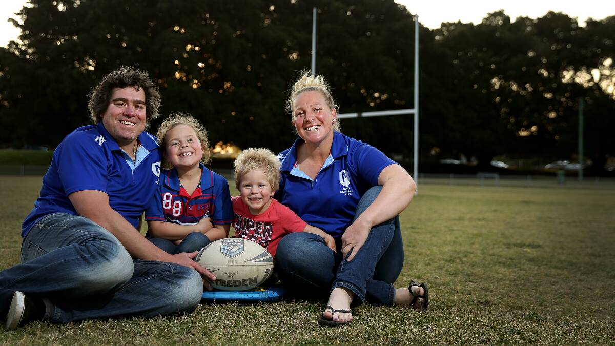 Bec Young (right) with husband Mick and their two children - Jarrah and Colbee - while playing with North Newcastle in 2017. Picture by Marina Neil