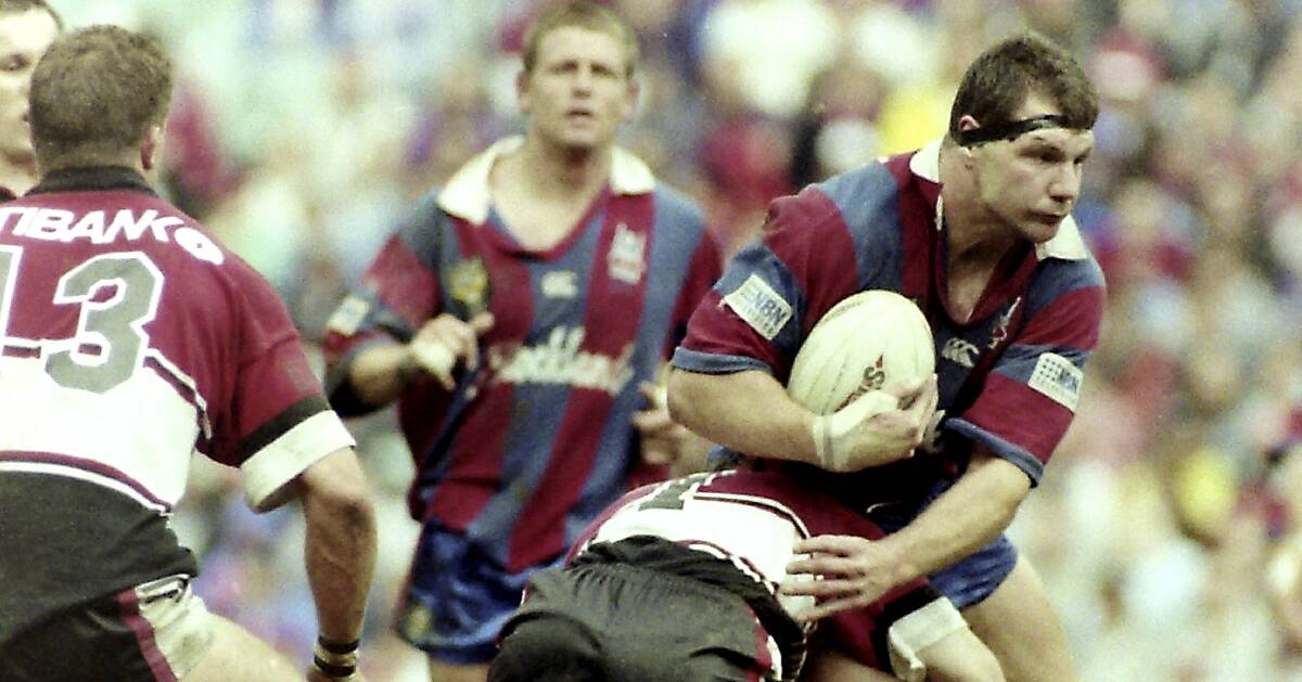 RED AND BLUE: Marc Glanville in action for the Knights in 1997. Picture: Peter Stoop