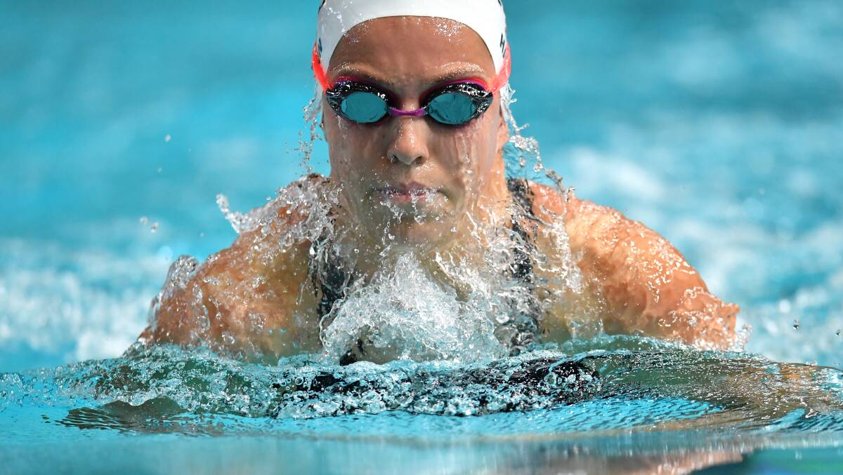 PODIUM: Abbey Harkin during Monday's 100m breaststroke heats in Brisbane. Picture: AAP