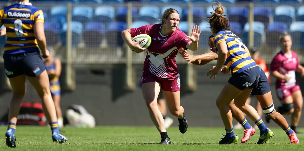FEND: Super W rookie Kaitlan Leaney playing Aon Women's Uni 7s for Newcastle at No.2 Sportsground in April. The Hunter Wildfires second-rower has the chance to represent NSW in her native Coffs Harbour. Picture: Jonathan Carroll