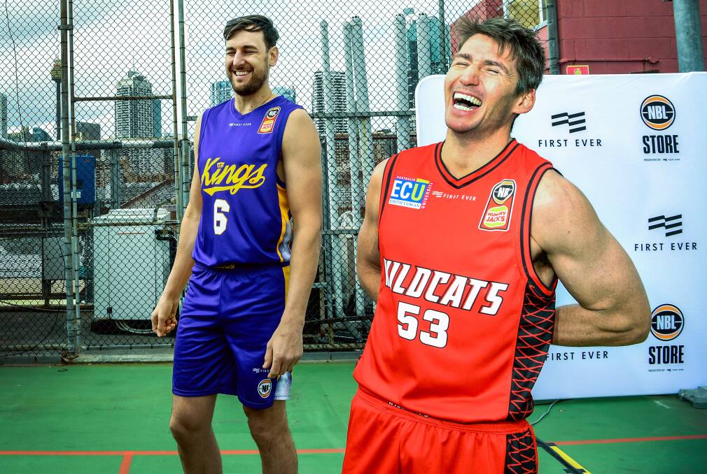 WE MEET AGAIN: Former AIS roommates and Olympic teammates Andrew Bogut (left) and Damian Martin (right) wearing their respective NBL uniforms in August ahead of the 2018-19 season, which tips off this week. Picture: AAP