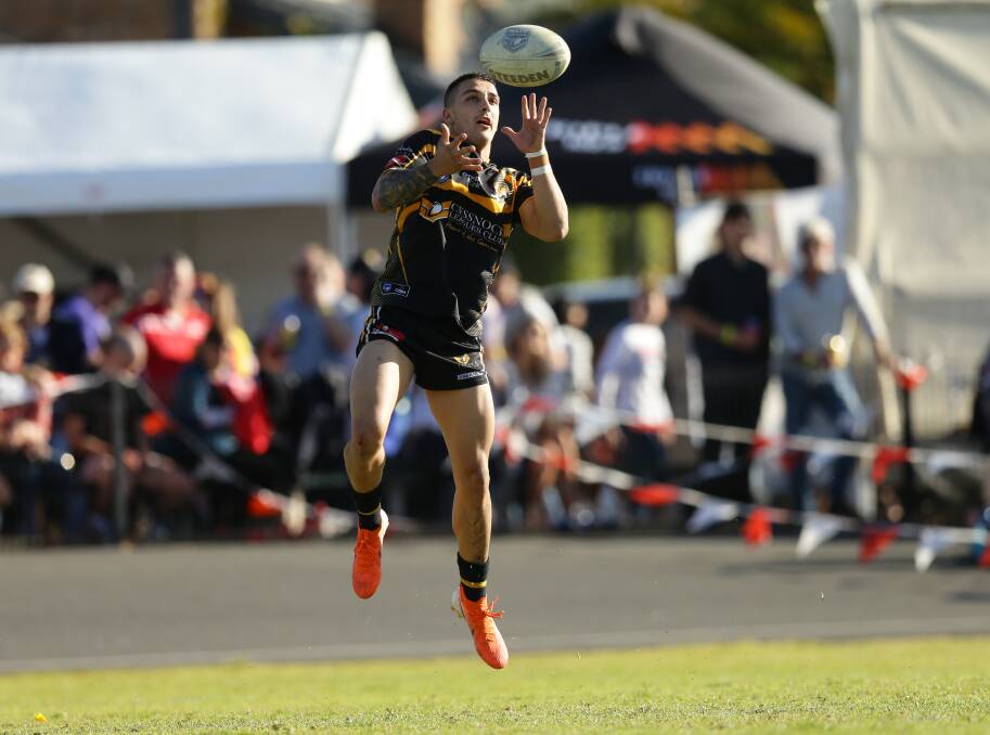 FULL FLIGHT: Cessnock Goannas winger Seaton Reid takes the ball during a last-round win over defending premiers Souths at Townson Oval. Picture: Jonathan Carroll 