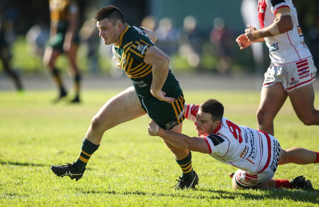 ON THE RUN: Macquarie's Luke Higgins playing against his former club Souths in round two. Picture: Marina Neil