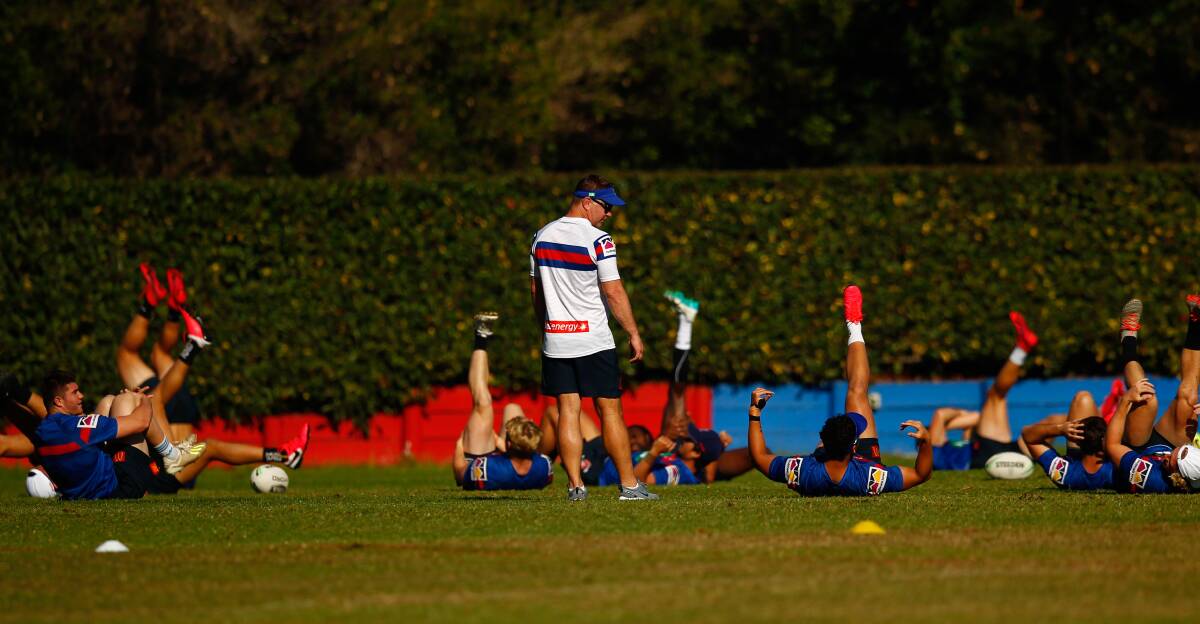 GOING THE DISTANCE: The Newcastle Knights do extra stretches at training on Tuesday, preparing for the potential extra minutes during this year's NRL season. Picture: Jonathan Carroll 