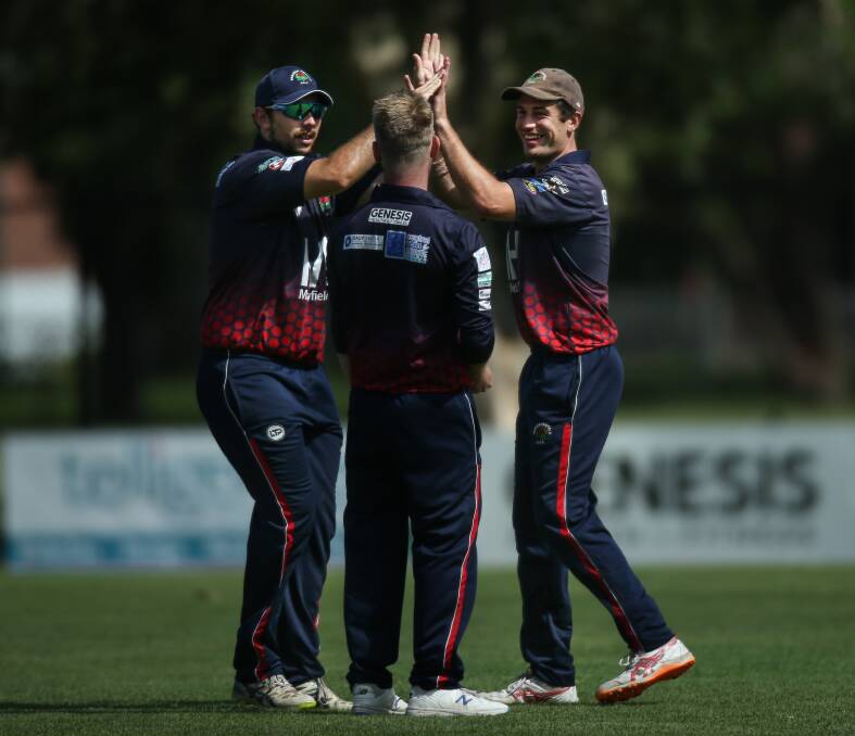 POSITIVES: Waratahs all-rounder Jonty Durrheim (right) celebrates a wicket with James Psarakis (left) and Nathan Hudson (centre) during the T20 Summer Bash final on Sunday. Picture: Marina Neil