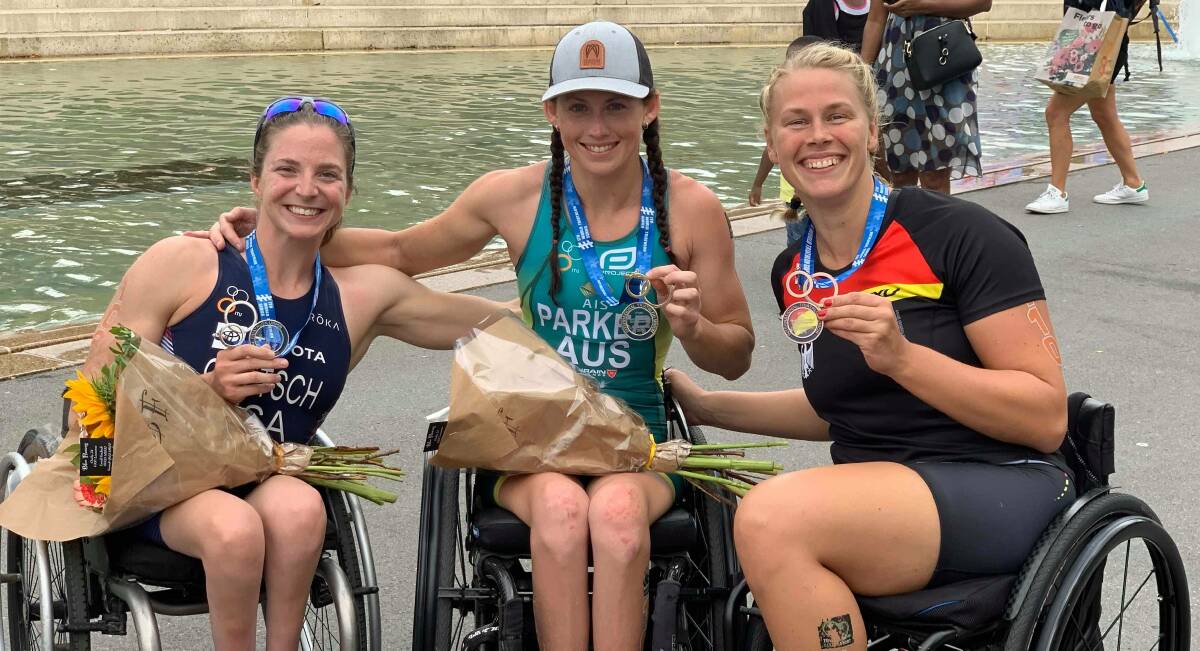 WORLD CHAMPION: Newcastle's Lauren Parker (centre) with her gold medal in Switzerland. Picture: Supplied