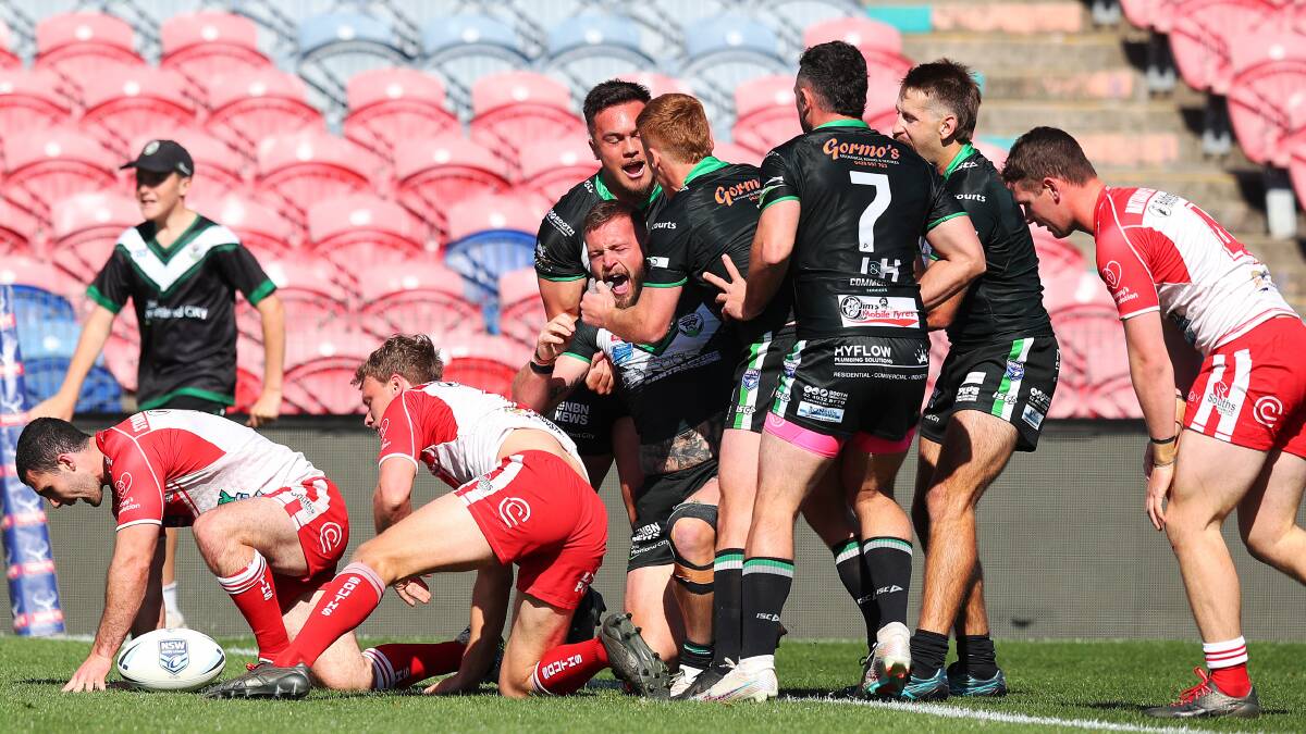 Maitland celebrates a try in last year's Newcastle RL grand final. Picture by Peter Lorimer