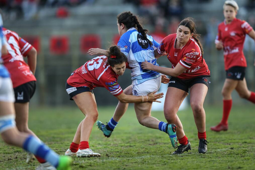 STEP UP: NSW Rugby League squad member Bobbi Law (right) playing for The Waratahs in the 2018 Newcastle Hunter Rugby Union women's grand final. Picture: Marina Neil