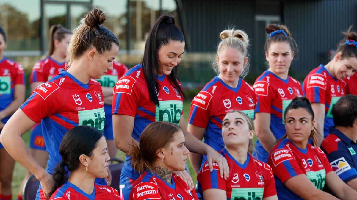MAIDEN RUN: Knights halfback Jesse Southwell (bottom row, third from left) during this week's NRLW team photo. Picture: Max Mason-Hubers
