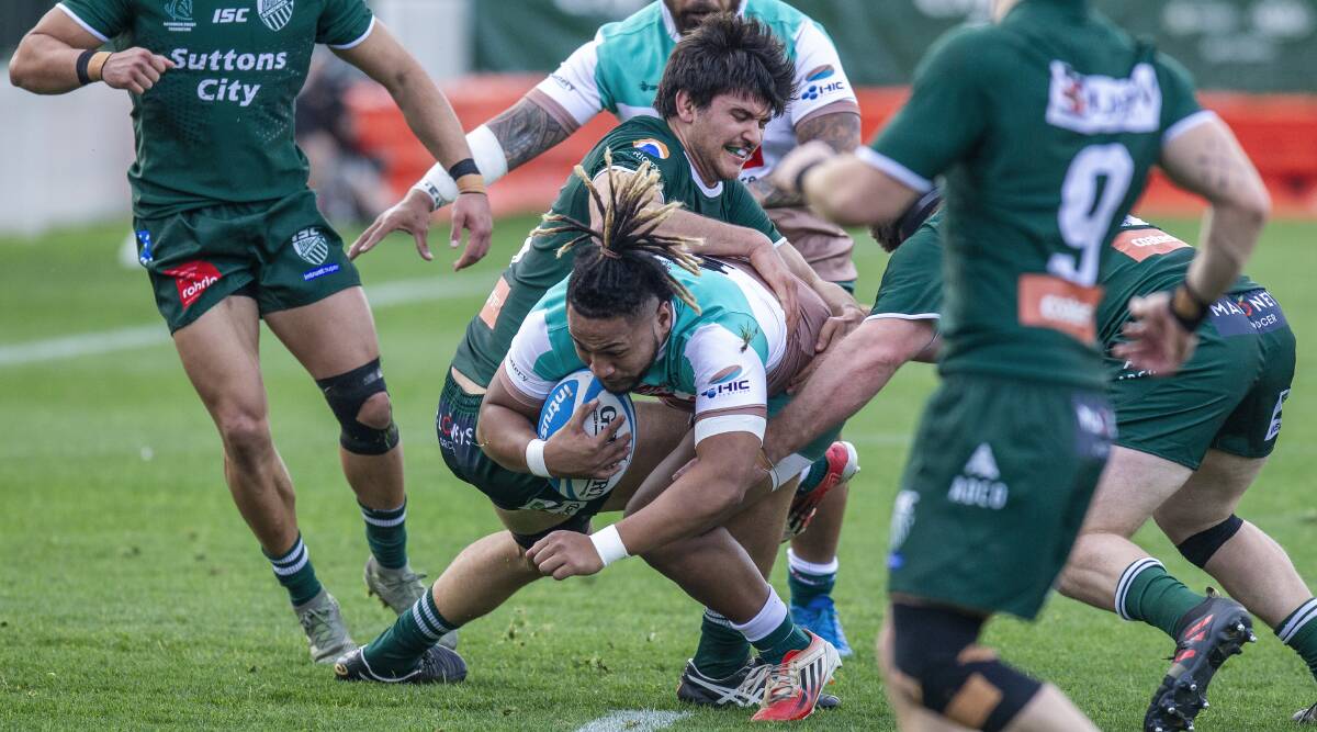 ROUGH START: Inside centre Taulogo Lalaga takes the ball up for the Hunter Wildfires, who were defeated 50-7 by Randwick at Coogee Oval on Saturday. Picture: Stewart Hazell
