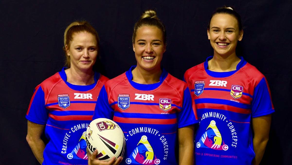 WINNERS ARE GRINNERS: Isabelle Kelly (centre) in her CRL Newcastle uniform earlier this year. Picture: Supplied
