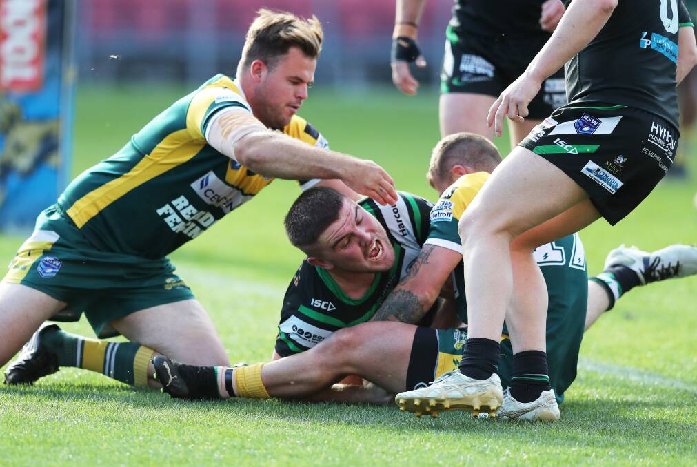 Butterfield scores a GF try in the first half. Picture by Peter Lorimer