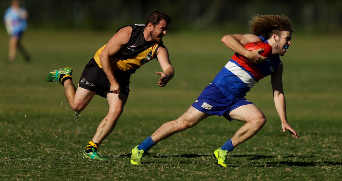 NEXT STEP: Warners Bay player Matthew Spinks (right) during last season. Picture: Jonathan Carroll
