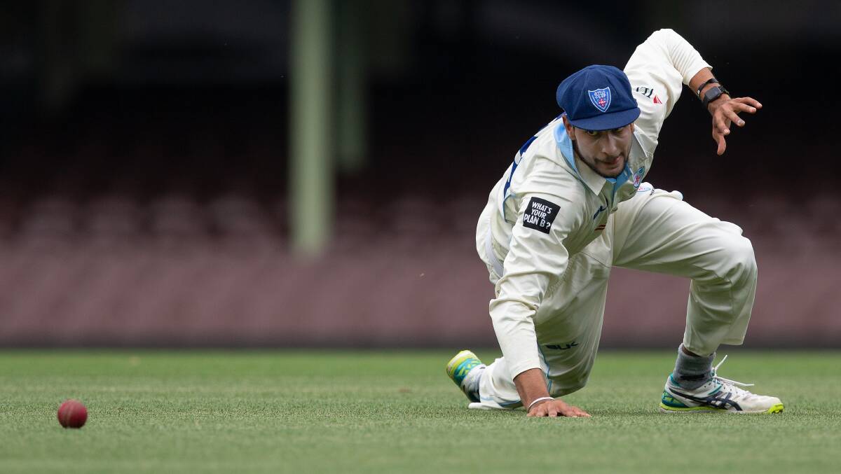 SHIELD: NSW player Jason Sangha in the field at the SCG on Wednesday. Picture: AAP