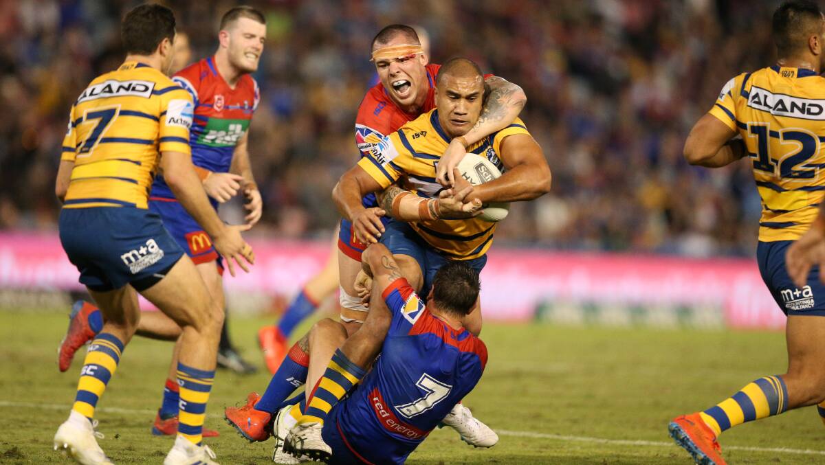 Peni Terepo playing NRL for the Eels against the Knights in Newcastle. Picture by Max Mason-Hubers