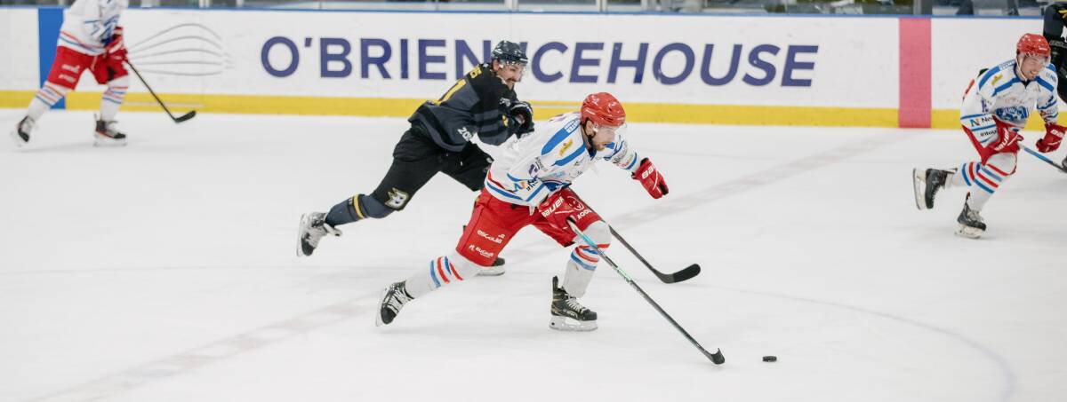 Francis Drolet (right) playing for the Newcastle Northstars against Canberra Brave in Sunday's national final in Melbourne. Picture: AK Hockey Shots
