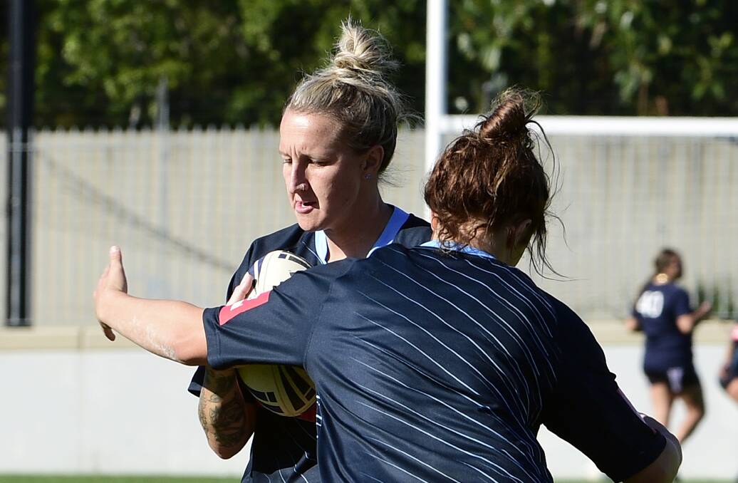 HIT UP: CRL Newcastle player Holli Wheeler training with NSW in Sydney earlier this month. Picture: AAP