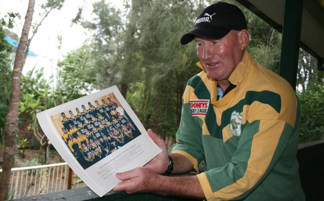 MEMORIES: Captain-coach of Macquarie's sole first grade premiership Mal Graham glances back at the 1991 team on Thursday. Picture: Josh Callinan