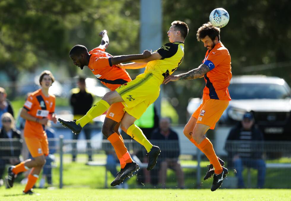 BACK OF THE NET: Joel Wood (right) netted for Valentine in a 6-3 loss to Rosebud at Adamstown Oval on Saturday. Nine is the most goals scored in a NNSW National Premier League fixture this season. Picture: Jonathan Carroll