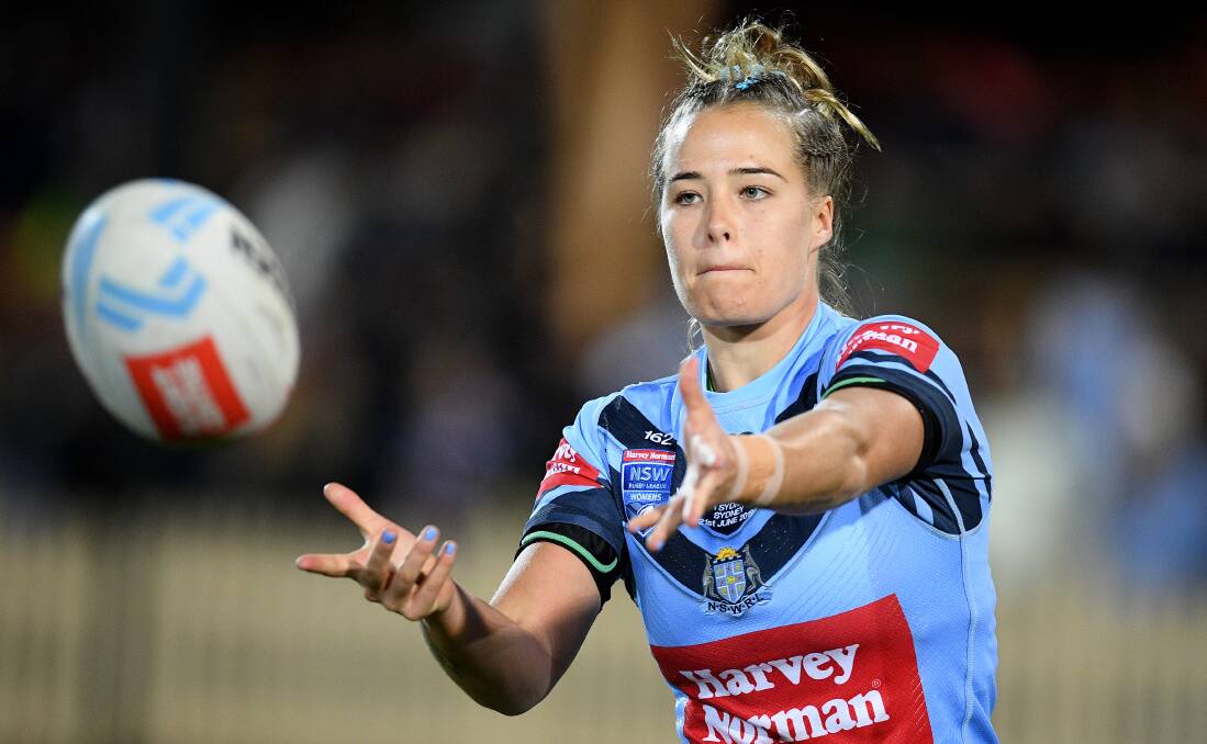 GREEN AND GOLD: CRL Newcastle representative Isabelle Kelly with NSW on Friday. Picture: AAP