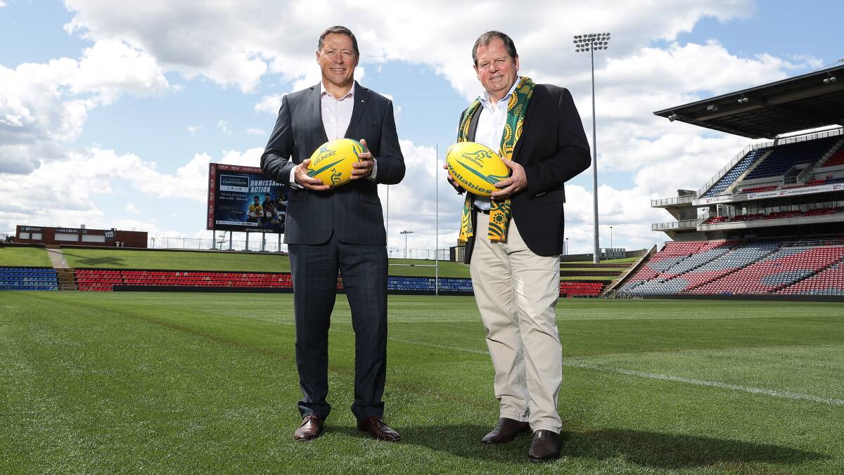 GAME ON: Phil Kearns and Bill Clifton at McDonald Jones Stadium on Thursday. The Newcastle venue will host back-to-back Tests on November 28. It may also be part of the country's 2027 World Cup bid. Picture: Rugby Australia